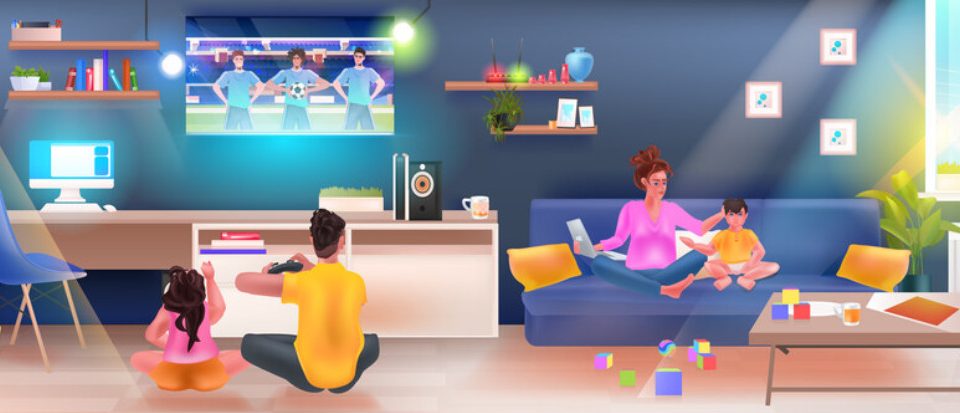 Happy family playing PS5 in media room